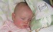 Sweet Evelyn sleeping away with her Little Giraffe blanket