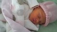 Sweet baby girl and her favorite Little Giraffe Luxe blanket