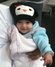 Beautiful Gracyn stays comfy & cozy with her Little Giraffe blanket