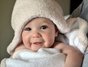 A very happy baby after bath time.