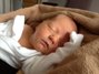 Ronan DOB 4-23-12.  His blanket has been with him since the day he was born.