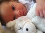 Baby Camila with her little giraffe blanky