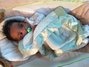 Baby Jaylon loves his soft blanket to much.